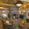 Peeled bark timberframe interior provides warmth and beauty